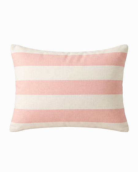 Striped pink and white pillow on a white background