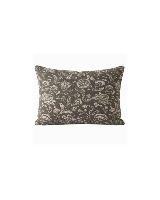 Decorative pillow with floral pattern on a white background