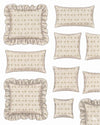 Collection of decorative pillows with ruffled edges on a white background