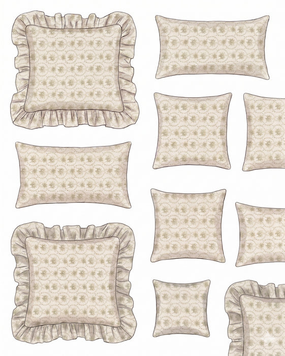 Collection of decorative pillows with ruffled edges on a white background