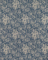 Floral patterned fabric with beige flowers on a blue background